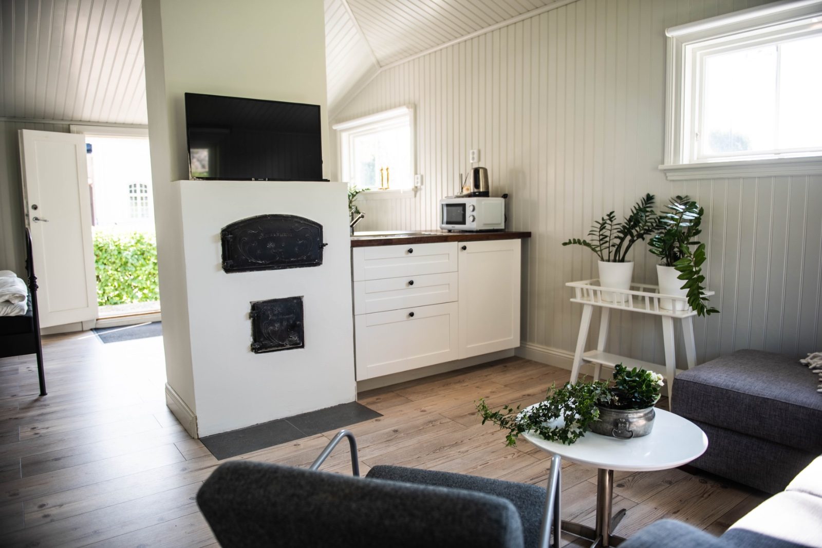 Pentry med kakelugn i Kanalvillan